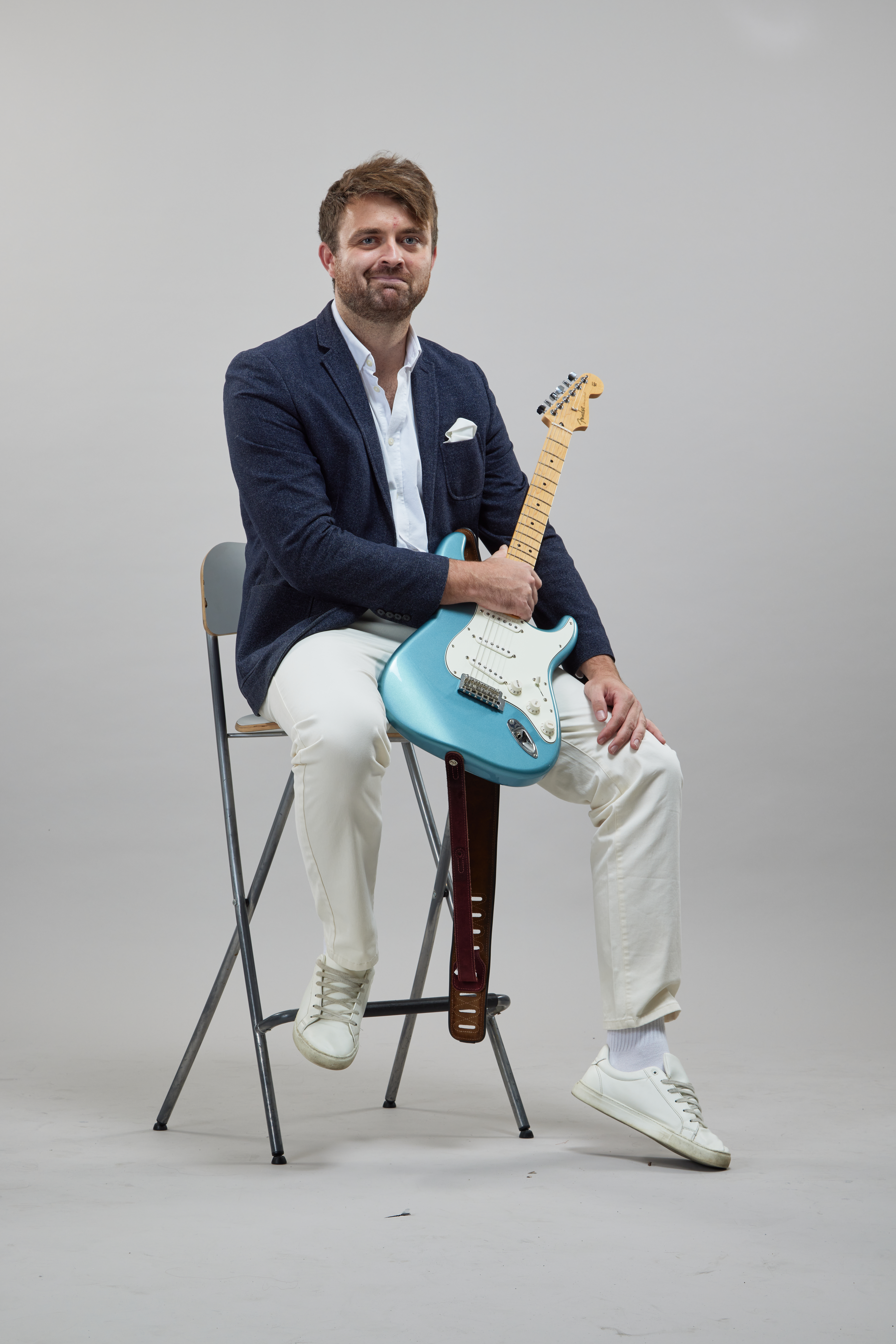 James Rumble with his Fender Stratocaster guitar